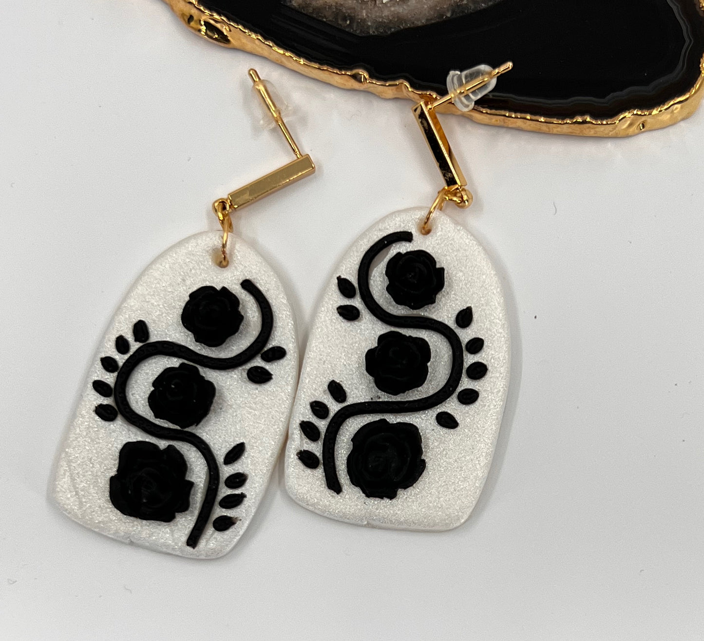 White plated medium lightweight Gold Earrings clay Black
