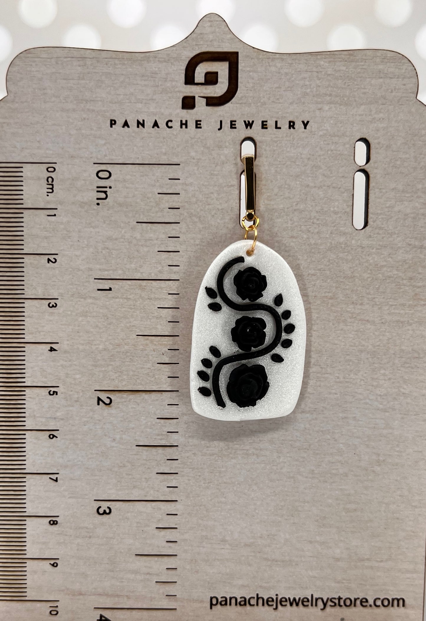 White plated medium lightweight Gold Earrings clay Black