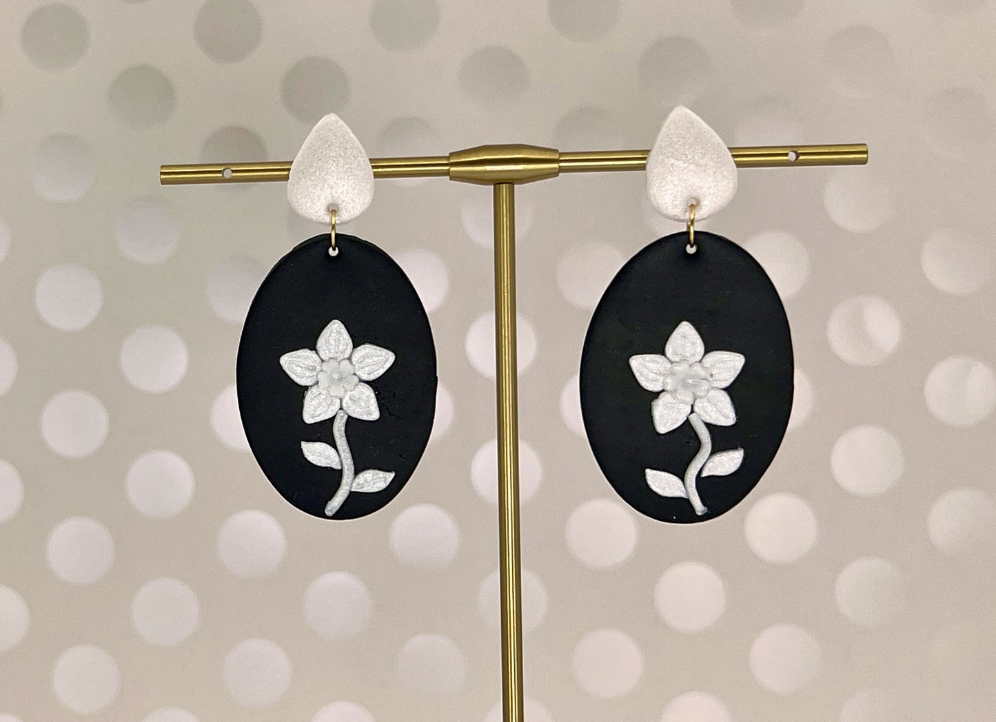 White plated medium lightweight Gold Earrings clay Black