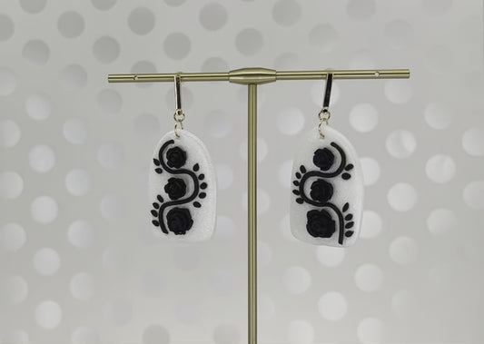 White plated medium lightweight Gold Earrings clay Black